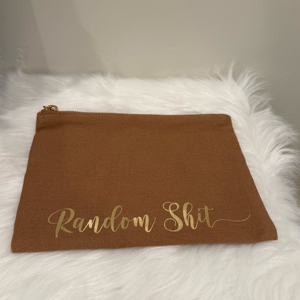 Zippered and lined pouch w/gold text & accents. Perfect for fun gifting. New.